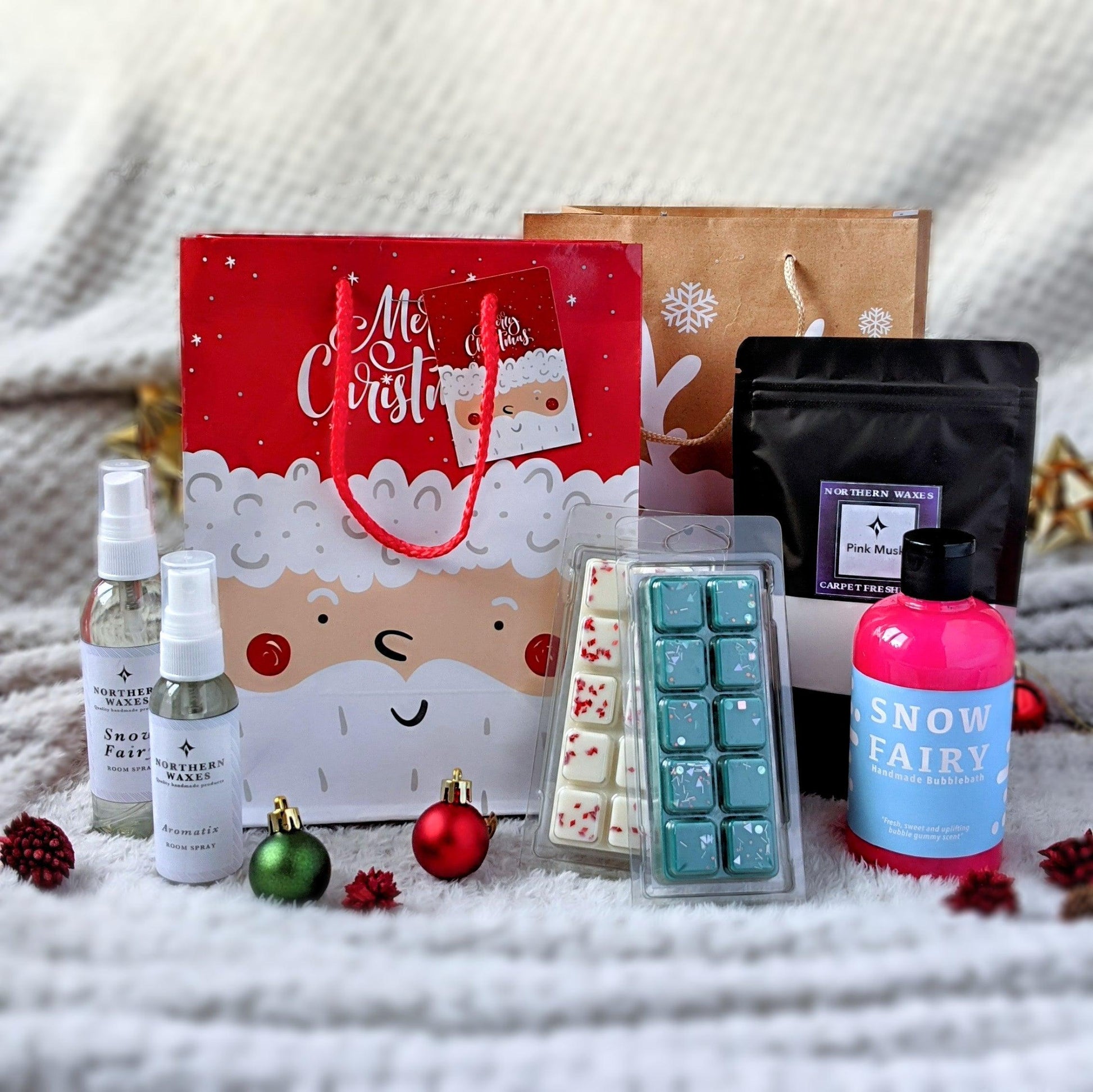 A festive themed gift bag with scented products