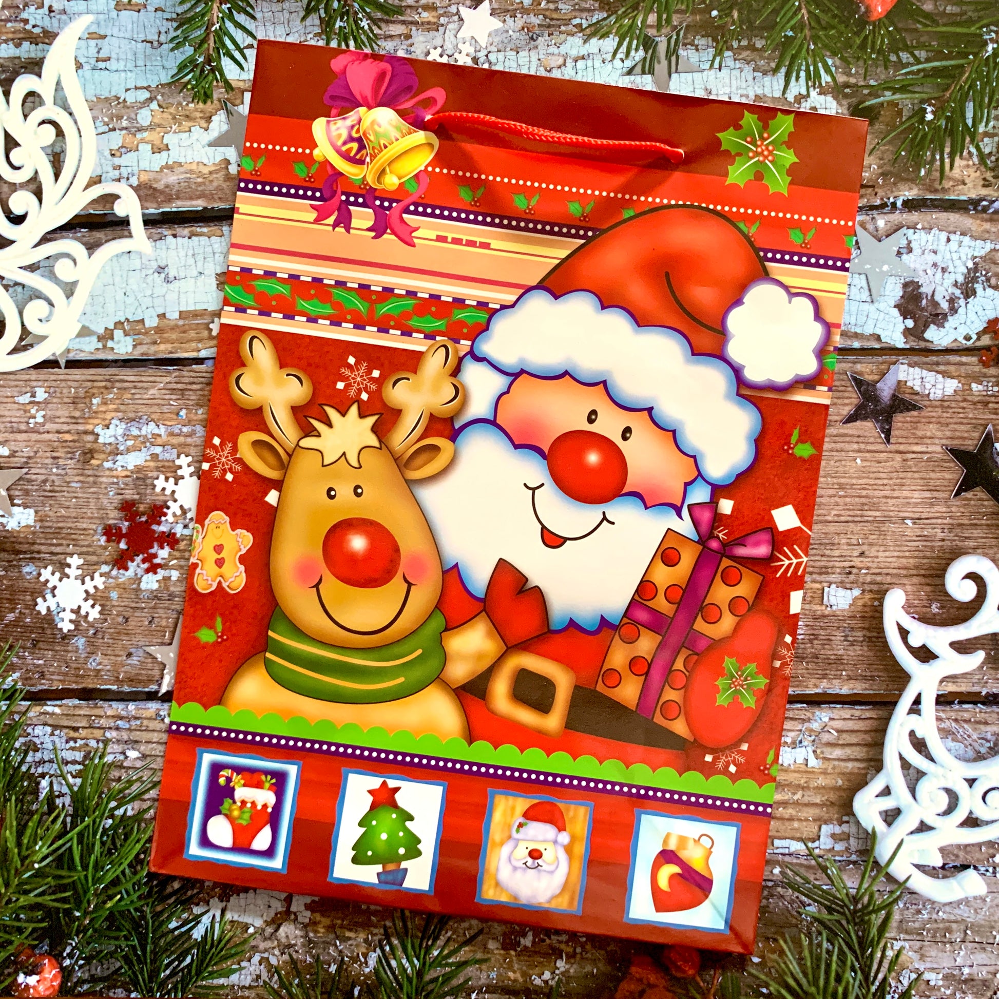 a Santa and Rudolph themed christmas bag